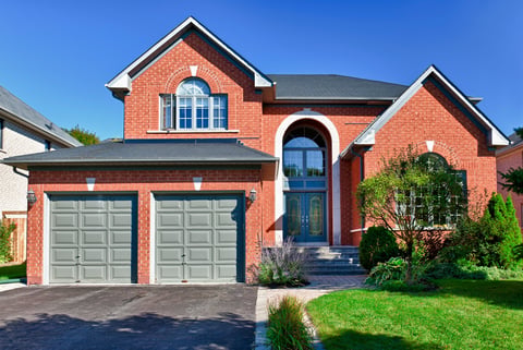British suburban brick house with garage